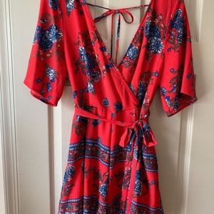 Vibrant red floral playsuit romper. Medium🌺